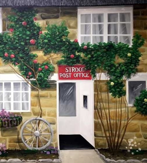 A wall mural of the old Strood Post Office with roses around the door